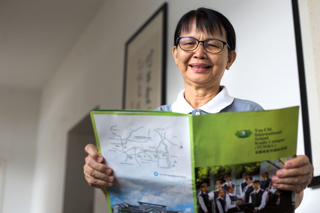 Cheak Wei Ying donated her gratuity fund from her 35 years of service in the education sector back to the education sector. [Photograph by Sam Pin Fook]